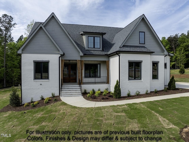 modern farmhouse style home featuring brick siding, roof with shingles, and a front yard
