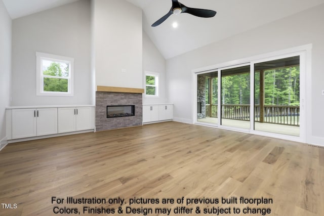 unfurnished living room featuring high vaulted ceiling, a fireplace, light wood finished floors, ceiling fan, and baseboards