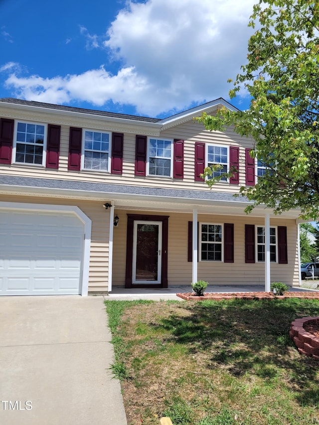 2121 Lime St, Durham, NC 27704 - view of front of home with a porch and driveway