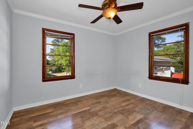 5830 Mcdougal Dr, Fayetteville, NC 28304 - unfurnished room featuring dark wood-style floors, ceiling fan, crown molding, and baseboards