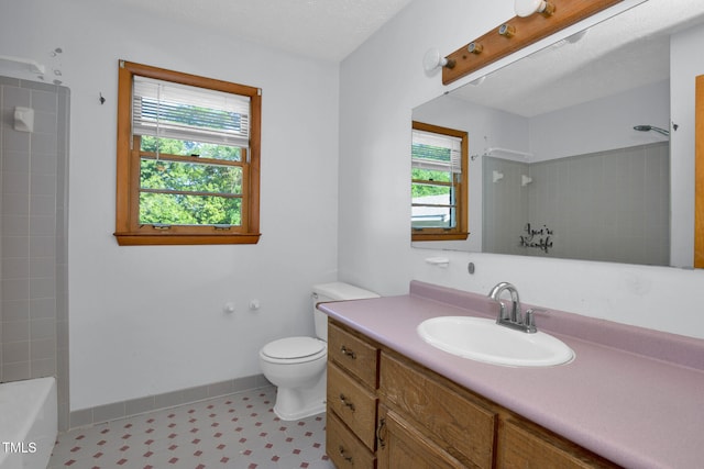 5830 Mcdougal Dr, Fayetteville, NC 28304 - bathroom with toilet, baseboards, vanity, and tile patterned floors