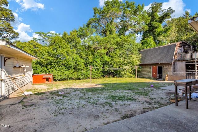 5830 Mcdougal Dr, Fayetteville, NC 28304 - view of grassy yard featuring an outbuilding