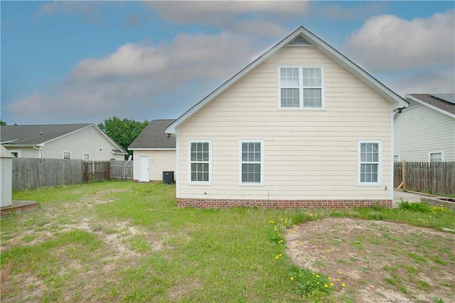 back of property with central AC unit