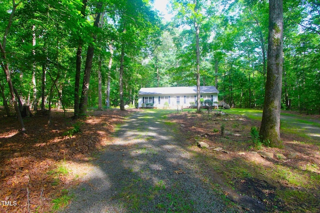 622 Enon Rd, Oxford, NC 27565 - single story home featuring dirt driveway and a wooded view