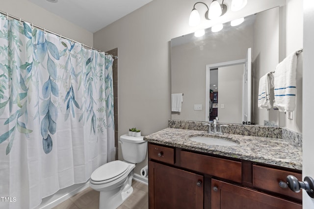 full bath featuring toilet and vanity