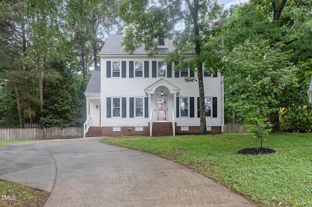 105 Houston Cir, Cary, NC 27513 - colonial house featuring crawl space, a shingled roof, and driveway
