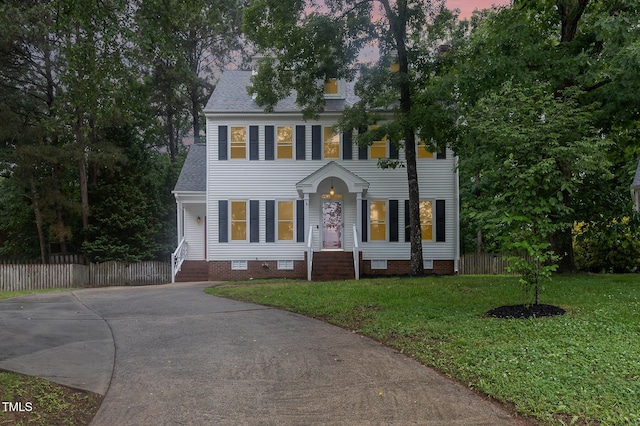 105 Houston Cir, Cary, NC 27513 - colonial-style house featuring crawl space, a shingled roof, and concrete driveway