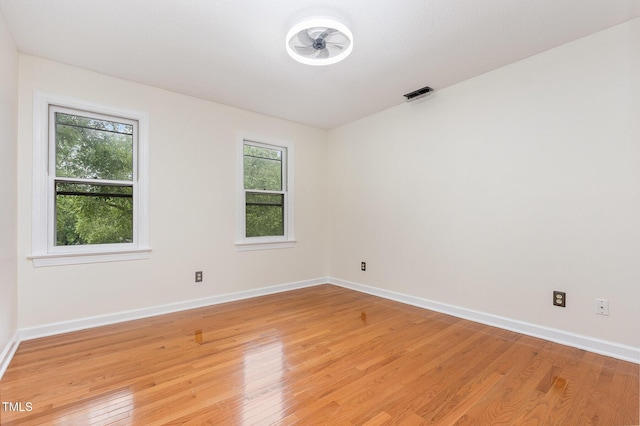 105 Houston Cir, Cary, NC 27513 - spare room with light wood-style flooring and baseboards