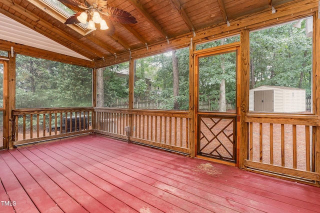 105 Houston Cir, Cary, NC 27513 - unfurnished sunroom with a ceiling fan, lofted ceiling, and view of scattered trees