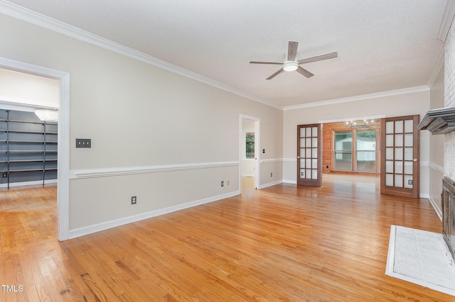 105 Houston Cir, Cary, NC 27513 - unfurnished living room featuring a chandelier, light wood-style floors, ceiling fan, ornamental molding, and baseboards