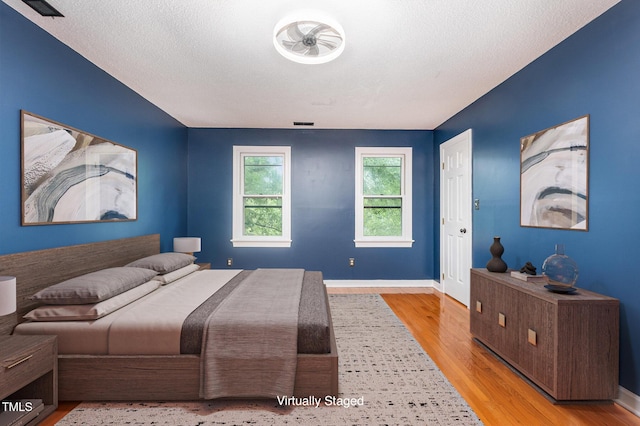 105 Houston Cir, Cary, NC 27513 - bedroom with wood finished floors and baseboards