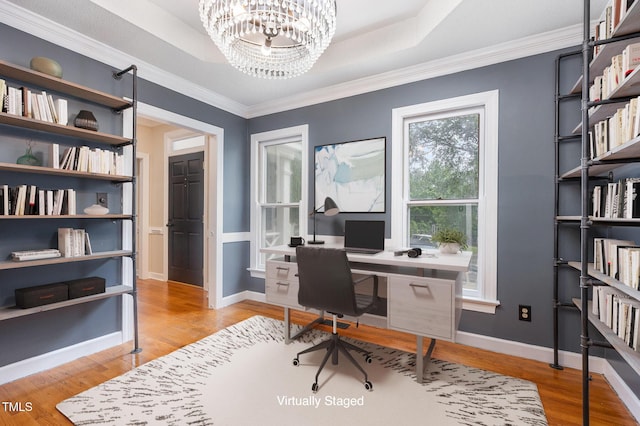 105 Houston Cir, Cary, NC 27513 - office space featuring light wood-style flooring, a chandelier, ornamental molding, baseboards, and a raised ceiling