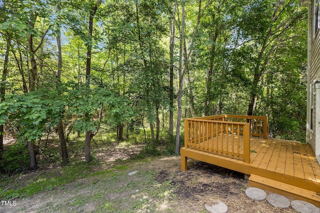 view of yard featuring a wooden deck