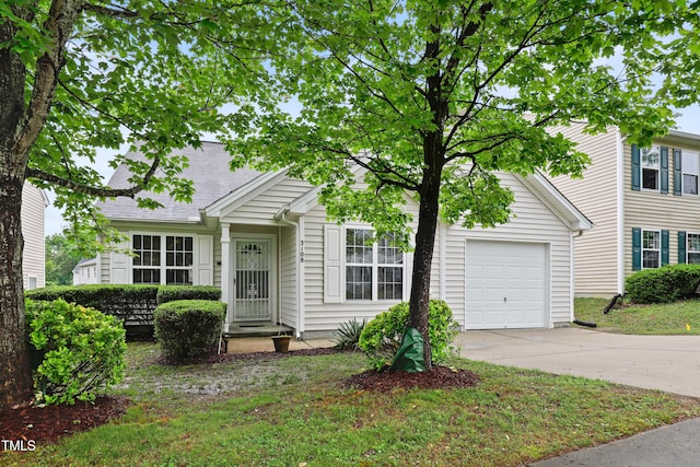 3108 Forrestal Dr, Durham, NC 27703 - view of front facade with a garage and driveway