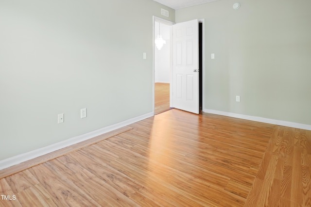 3108 Forrestal Dr, Durham, NC 27703 - empty room with light wood-style floors and baseboards
