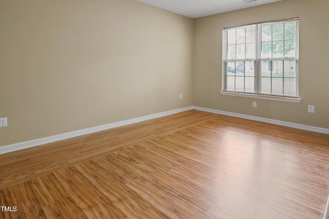 3108 Forrestal Dr, Durham, NC 27703 - empty room featuring baseboards and light wood-style flooring