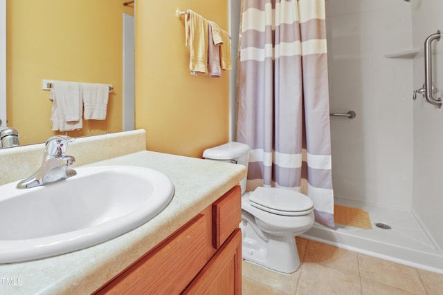 3108 Forrestal Dr, Durham, NC 27703 - bathroom with a stall shower, tile patterned floors, vanity, and toilet