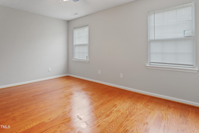 3108 Forrestal Dr, Durham, NC 27703 - unfurnished room featuring baseboards, light wood finished floors, and a ceiling fan