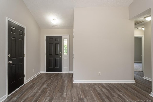 551 Hobson Rd, Raeford, NC 28376 - entrance foyer featuring dark wood-type flooring and baseboards