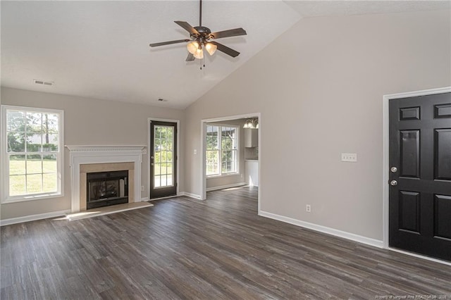 551 Hobson Rd, Raeford, NC 28376 - unfurnished living room with high vaulted ceiling, baseboards, dark wood finished floors, a ceiling fan, and plenty of natural light
