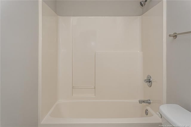 551 Hobson Rd, Raeford, NC 28376 - bathroom featuring toilet and washtub / shower combination