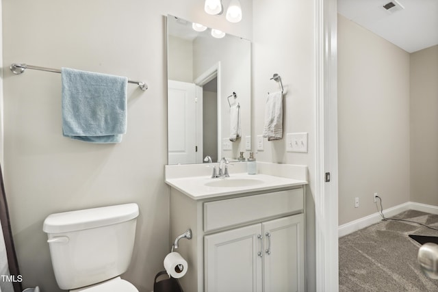 127 Manordale Dr, Chapel Hill, NC 27517 - bathroom with toilet, vanity, and baseboards