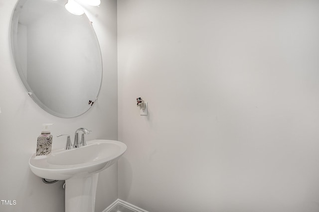 bathroom with baseboards