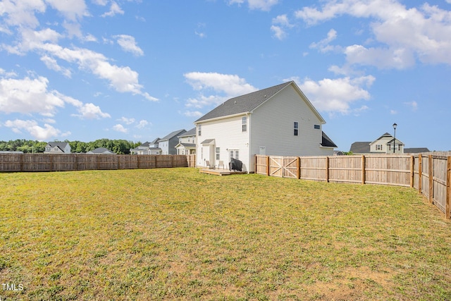view of yard with a wooden deck