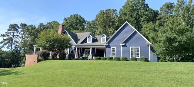 4874 Thom Rd, Mebane, NC 27302 - view of front of property featuring a front lawn, covered porch, and a chimney