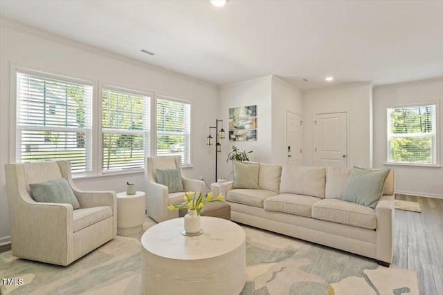 1440 Latham Garden Dr, Wake Forest, NC 27587 - living room featuring wood finished floors, crown molding, baseboards, and recessed lighting