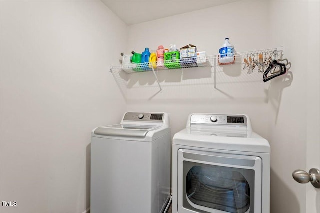 1440 Latham Garden Dr, Wake Forest, NC 27587 - clothes washing area featuring washing machine and dryer