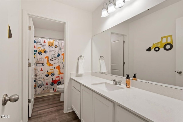 1440 Latham Garden Dr, Wake Forest, NC 27587 - full bath featuring toilet, wood finished floors, vanity, and a shower with shower curtain