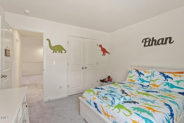 1440 Latham Garden Dr, Wake Forest, NC 27587 - bedroom with light carpet and a closet