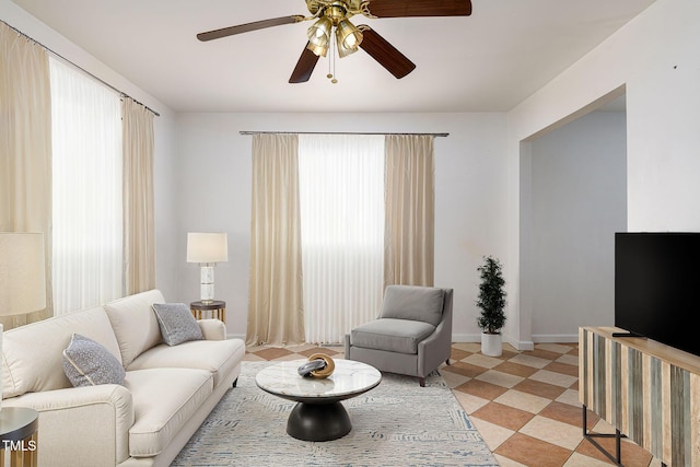 1309 Jackson St, Burlington, NC 27217 - living area featuring ceiling fan and baseboards