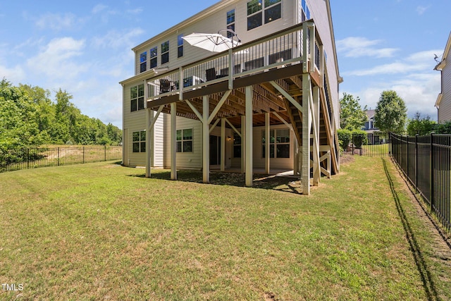 back of property with a deck
