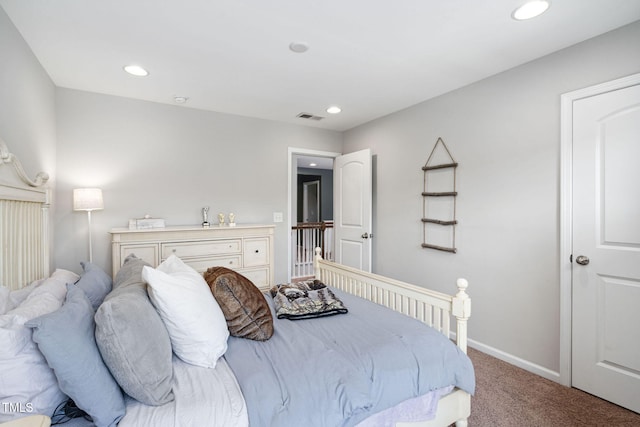 bedroom with carpet floors, recessed lighting, and baseboards