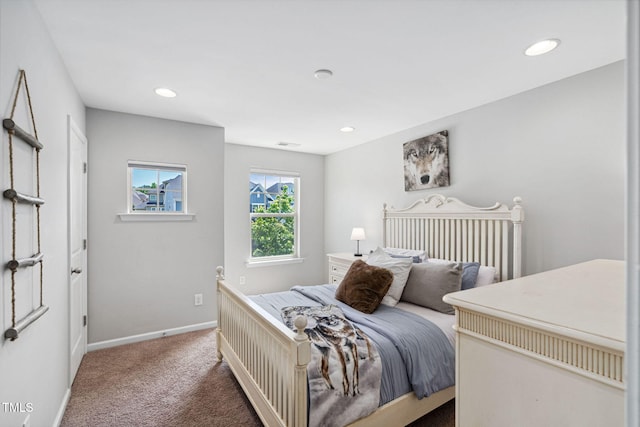 carpeted bedroom with baseboards and recessed lighting