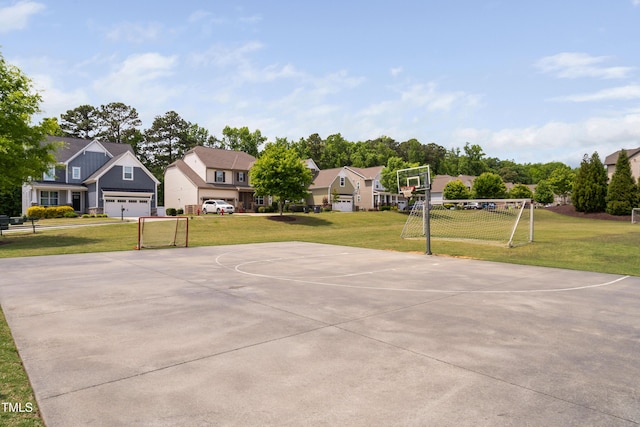 view of basketball court featuring an area for soccer, community basketball court, and a residential view