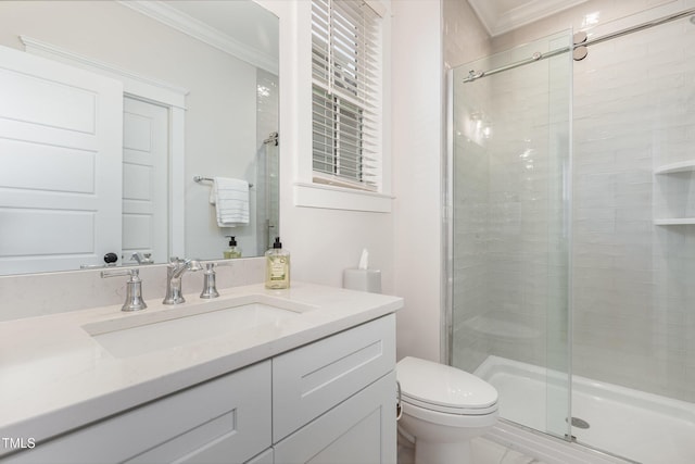 full bathroom featuring crown molding, a shower stall, toilet, and vanity