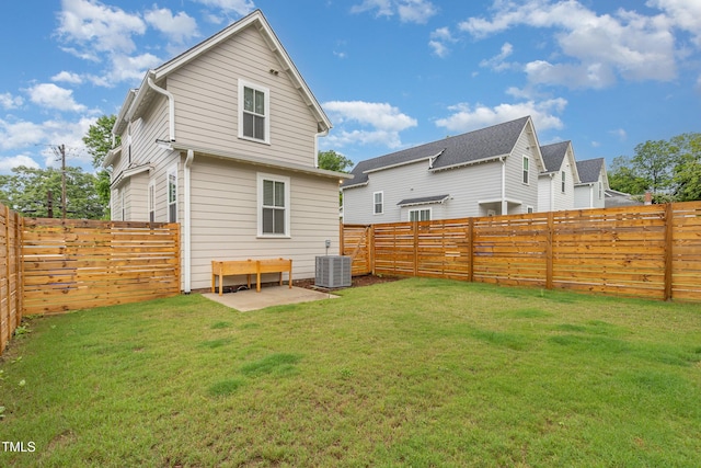 back of property featuring a patio and central AC unit