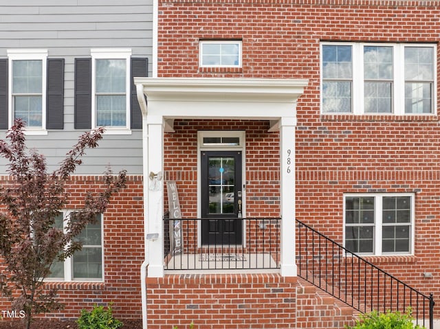986 Gateway Commons Cir, Wake Forest, NC 27587 - property entrance featuring brick siding