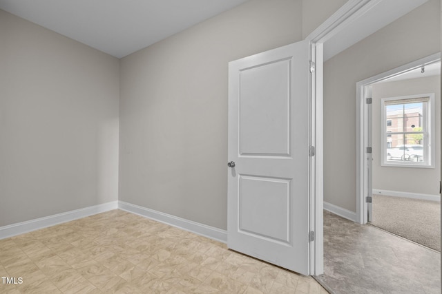986 Gateway Commons Cir, Wake Forest, NC 27587 - spare room featuring baseboards and light flooring