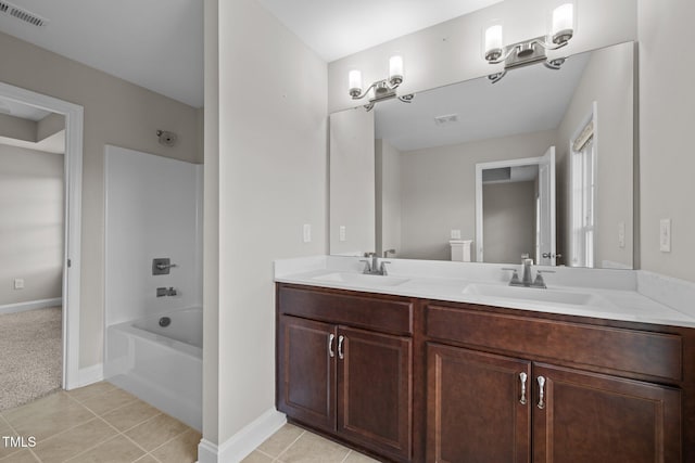 986 Gateway Commons Cir, Wake Forest, NC 27587 - full bath featuring double vanity, baseboards, and tile patterned flooring