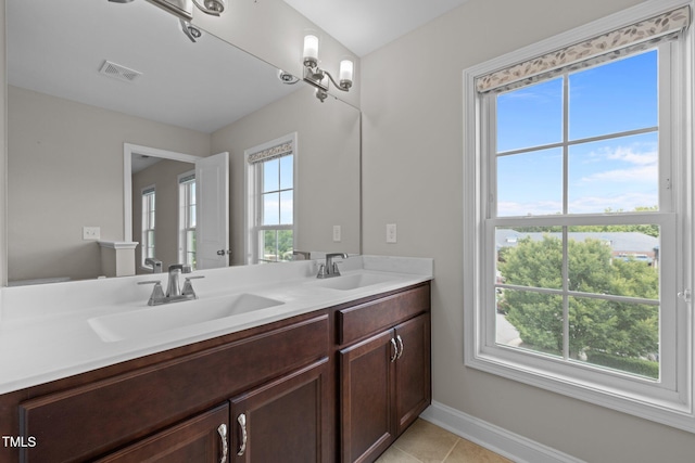 986 Gateway Commons Cir, Wake Forest, NC 27587 - full bath featuring double vanity, baseboards, and tile patterned flooring