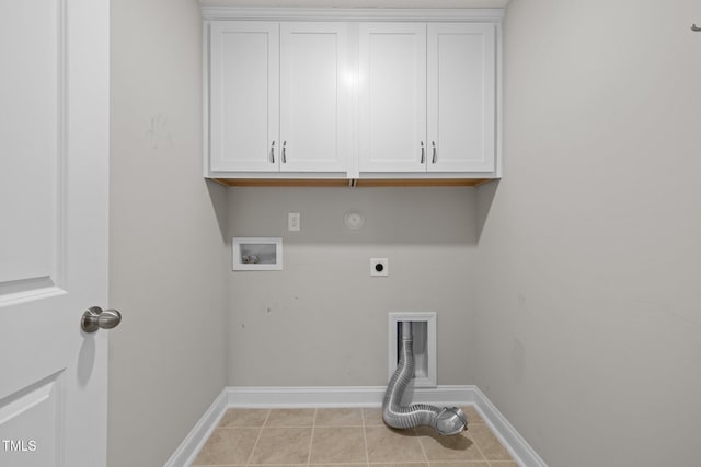 986 Gateway Commons Cir, Wake Forest, NC 27587 - washroom with electric dryer hookup, baseboards, hookup for a washing machine, cabinet space, and hookup for a gas dryer