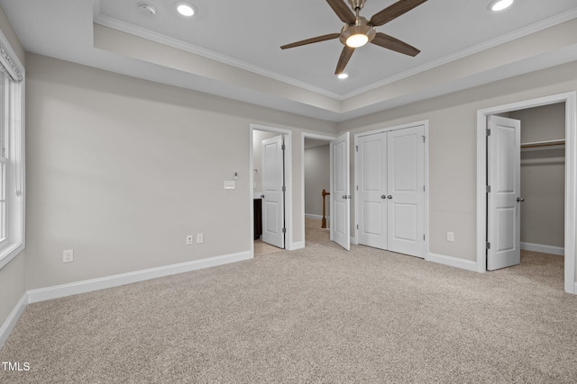 986 Gateway Commons Cir, Wake Forest, NC 27587 - unfurnished bedroom featuring light colored carpet, crown molding, recessed lighting, baseboards, and a raised ceiling