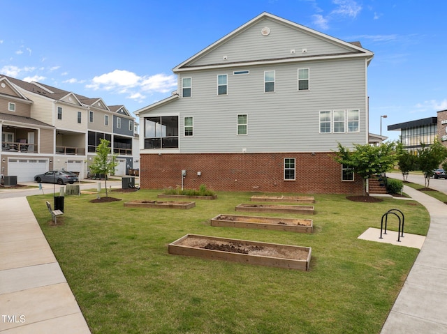 986 Gateway Commons Cir, Wake Forest, NC 27587 - surrounding community featuring a yard and a garden