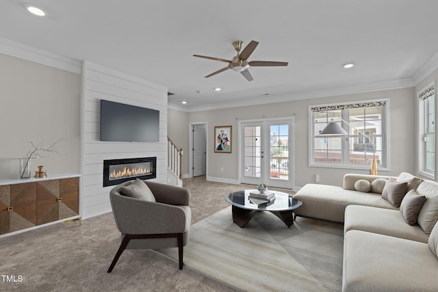 986 Gateway Commons Cir, Wake Forest, NC 27587 - carpeted living room featuring recessed lighting, crown molding, a ceiling fan, a fireplace, and baseboards