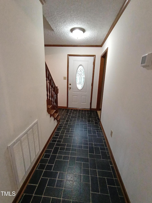 3300 Barnsley Ln, Raleigh, NC 27604 - entryway featuring a textured ceiling, crown molding, and stairs
