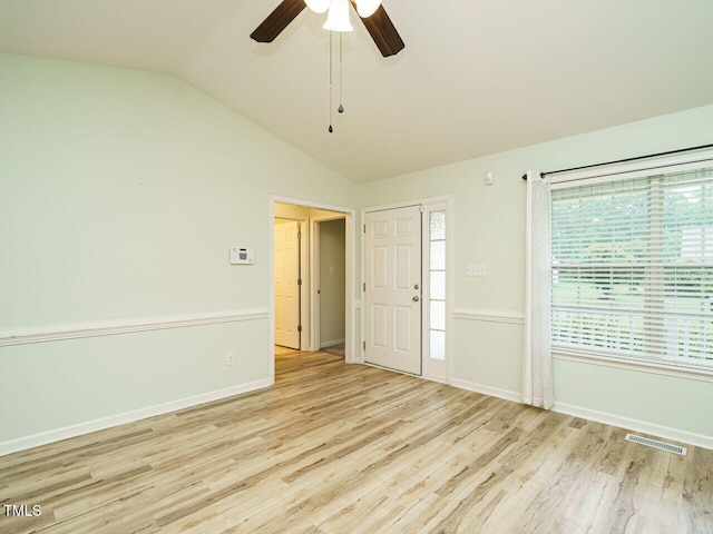 253 Middle Landing Dr, Smithfield, NC 27577 - unfurnished room featuring lofted ceiling, wood finished floors, a ceiling fan, and baseboards